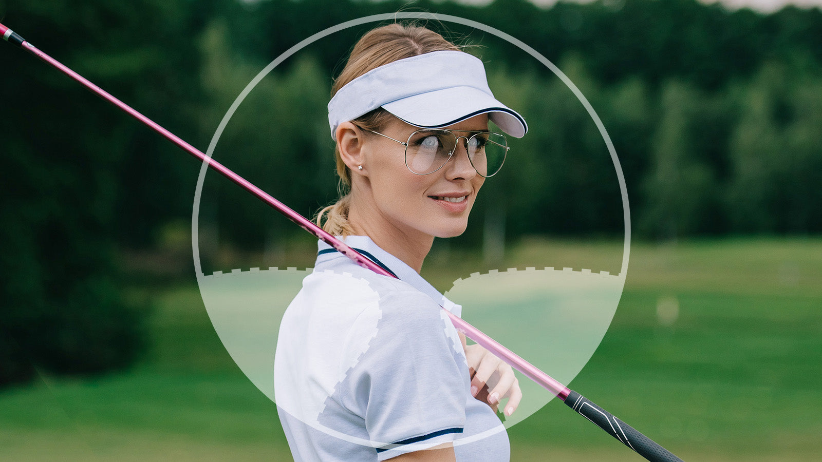 Woman holding a golf club on a golf course